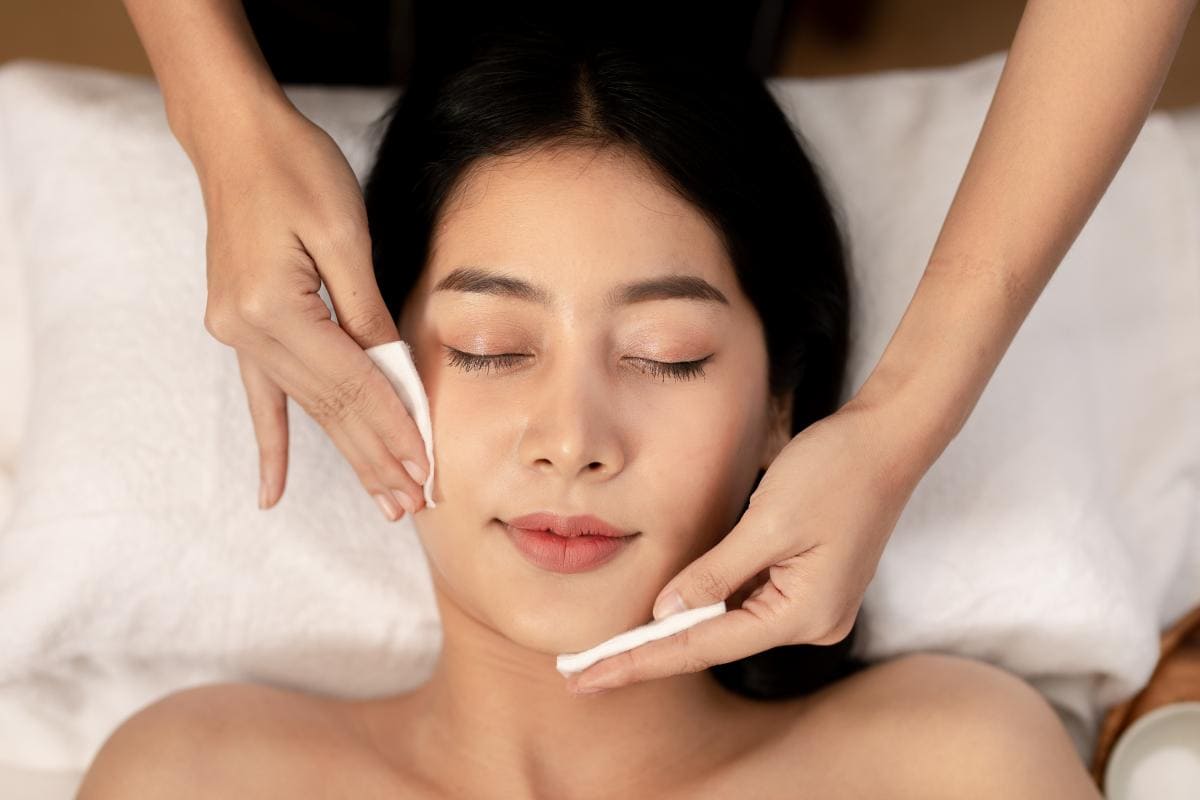 Woman enjoying a facial treatment at Makkha Health & Spa