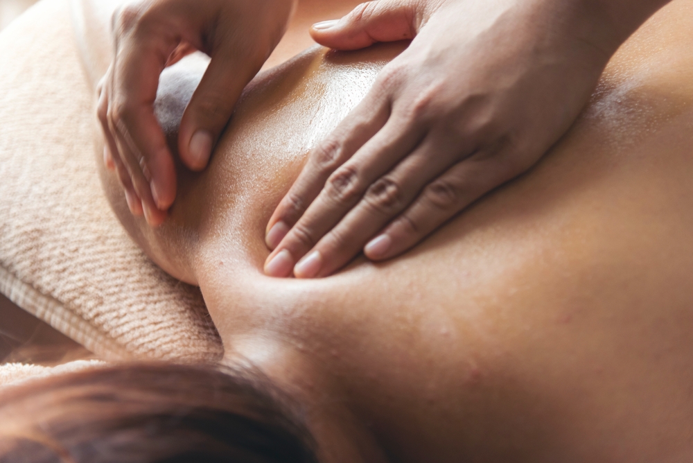 A woman getting a back massage