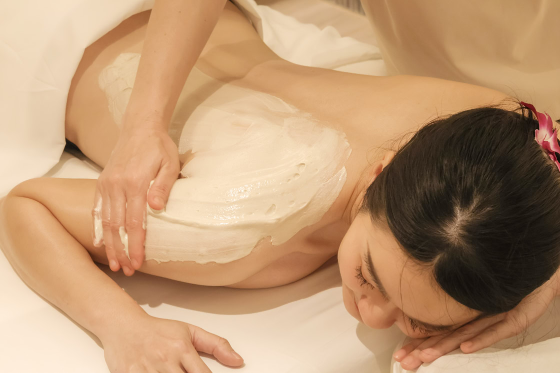 A woman enjoying her full body mask spa at Makkha Health & Spa