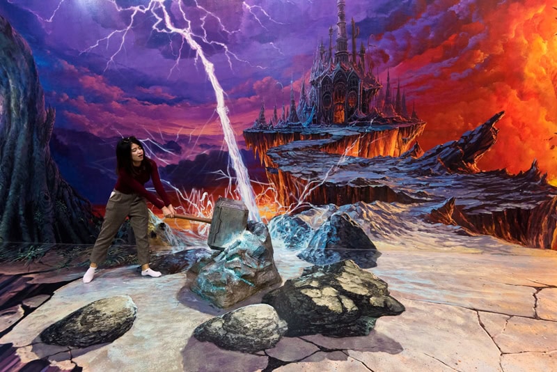 Fantasy-themed scene with a woman standing on rocky terrain, lightning striking near a mystical castle in a dramatic, colorful sky, evoking adventure and magic.