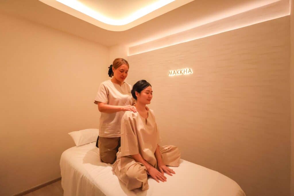 [Image: Therapist performing a traditional Thai massage at Makkha Health & Spa in Phuket]