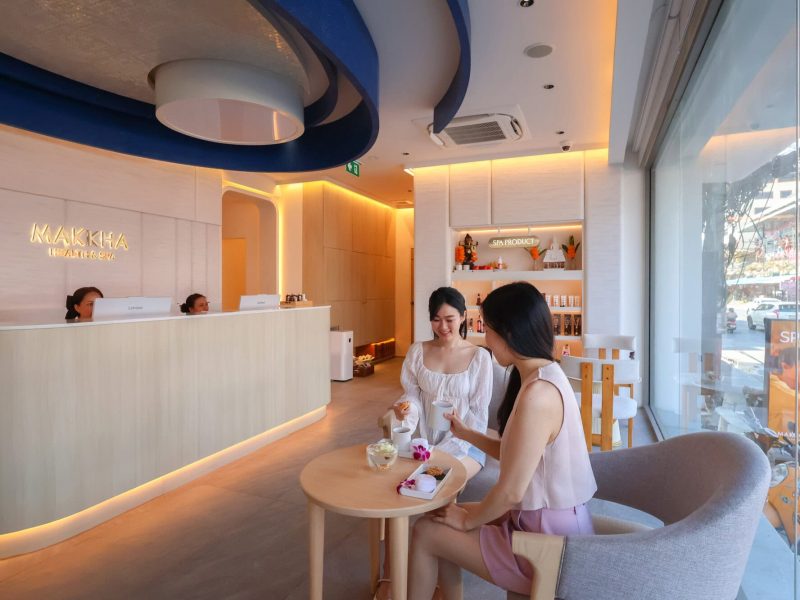Relaxing spa reception area at Makkha Spa in Chiangmai with friendly staff and modern interior design.