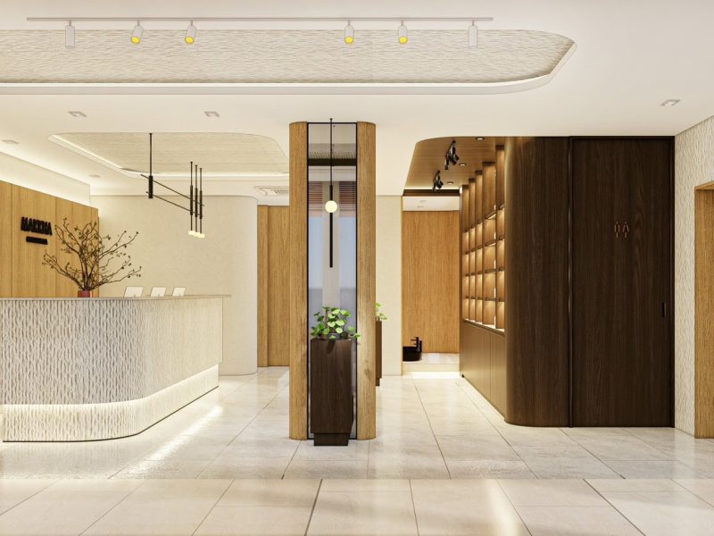 Relaxing spa reception area with modern wooden accents, soft lighting, and a welcoming atmosphere at Makkha Spa in Chiangmai.