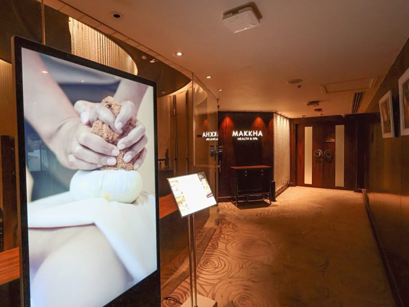 A calming spa reception area at Makkha Spa Chiangmai, featuring warm lighting, elegant decor, and a welcoming atmosphere perfect for relaxation and wellness experiences.
